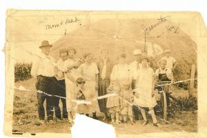 Mt. Carmel.  Where Lillian was born.  Picture taken on someone's farm.  Lillian in front with dark hair. ? year

 (~1926)