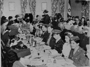 Sedar at Hovas Hocham, the Shul in Vincennes, IN.
April 8, 1944.  Louis Dumes leading the service, standing with his back to us.
 (1944)