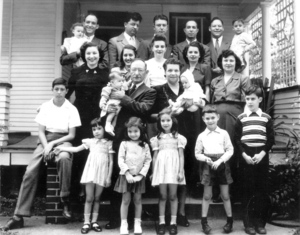 Louis Dumes Family taken at Louis and Rebecca's
Vincennes home on St. Clair Street.

Top row L to R:

Bill Dumes with Sharon, Samuel Zoll, Hyman Dumes, Ben Karp, Sol Dumes with Ricky Dumes

Next Row:

Lilliam Dumes Zoll, Elaine Cohen Dumes, Evelyn Swimmer Dumes, Irene Melcher Dumes

Next Row:

Sol Francis Karp, Louis Dumes with Deborah Zoll Altschuler, Rebecca Stein Dumes with Denise Dumes, Jeannette Dumes Karp

Front row:

Beverly Karp Mahone, Cyril-Ann Zoll Rosenberg, Karen Karp Finkelstein, Michael Dumes, John Karp (~1947)