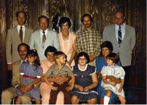 Back row, L to R: Mike Dumes, Sol Dumes, Rose Dumes, Randy Dumes, Max Conrad

Front Row: Rick Dumes holding Heidi Dumes, Denise Dmes Conrad holding Travis Conrad, Carla Conrad, Linda Dumes holding Kimberly Dumes (1980)