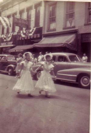 Karen Karp Finkelstein on left, Beverly Karp Mahone on right, in Parade for Sesquicentennial (150 yrs)of Vincennes, IN  
 (about1949)