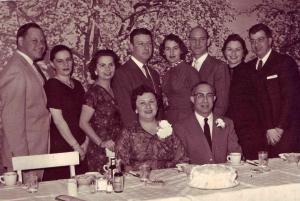 Louis dumes children with spouses.  From left-Sol and Evelyn, Irene and Hyman, Elaine and Bill, Lillian and Sam Zoll, front Jeannette and Ben Karp at 25th wedding Anniversary dinner for Ben and Jeannette. January, 1958. (1958)