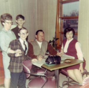 Passover 1966 at home of William J. Dumes in Vincennes.  Pictured are Mildred Dumes Dansker (far left), Randy Dumes behind her, Bruce Dumes in front of her in the horrible jacket, Sol and Rose Dumes. (1966)