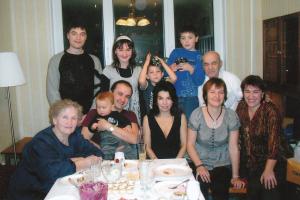 George Patinov and his descendents, taken Jan 1, 2008. 

First row (from left to right)
Vaperiya Platonova, wife of George, Maxim, son of Peter, grandson of George, Peter, born in 1971, son of George, grandson of Polina, great-grandson Genoch Dumesh,
Julia Olenchuk, born in 1961 - daughter of George, granddaughter of Polina, great-granddaughter of Genoch Dumesh,
Natalia Platonova, wife of Peter,
Natalia Gasanbekova born in 1975, daughter of George, granddaughter of Polina, great-granddaughter of Genoch Dumesh
 
second row (from left to right)
Vladislav Olenchuk, born in 1985 - son of Julia, the grandson of George, the great-great grandson of Genoch Dumesh,
Alexandra, born in  1995, daughter of Peter, the granddaughter of George, the great-great granddaughter of Genoch Dumesh,
Timur Gasanbekov, born in 2002, son of Natalia, grandson of George, the great-great grandson Genoch Dumesh, Murad Gasanbekov, born in 1998, son of Natalia, the grandson of George, the great-great grandson Genoch Dumesh,
George Platonov, son Polina, great-grandson of Genoha Dumesh  (2008)