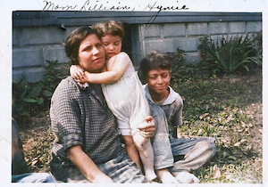 There's something about color. The original version of this photo looks like it could be some family in The Grapes of Wrath, struggling to get food on the table. But the color version brings out the familial warmth. The little girl is Lillian Dumes Zoll, daughter of Louis and Rebecca Stein Dumes. The older boy is their eldest son, Hy Dumes. Lillian was born in 1922, so this is perhaps '24 or '25?  (1924)