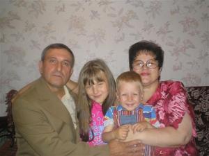 Cousin Julia Aleskevica and her husband and grandchildren in Daugavpils Latvia. (~2007)