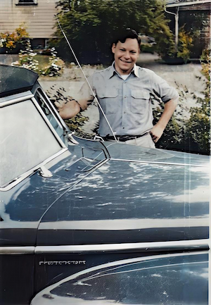 Sol Dumes with car. I'm guessing at the year.