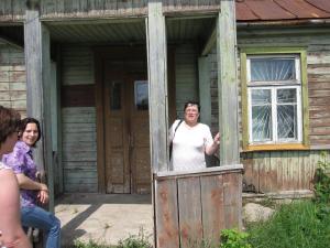 Julia at her old home in Vishki, Marina on the left (2009)