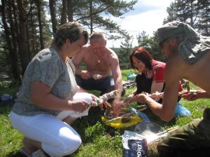 Tanya, Misha, Marina and Sergey making Shashlik (shish-ka-bob) (2009)