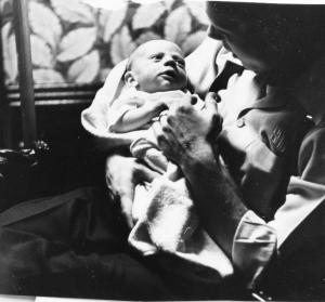 Stan Dumes holding Harold Dumes (~1952)