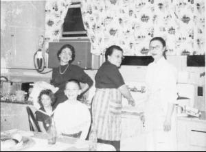 Harold and Sandi Dumes in front, unknown back left, Freda Dumes in the middle and Betty Friedman (family friend) on right (~1960)