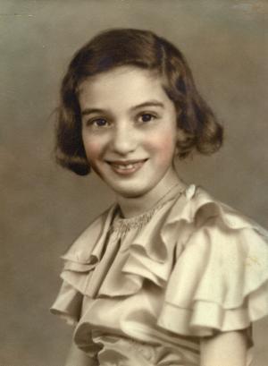 Ruth Fishman Zimbler,  11 years old.  June 1936 wearing her aqua blue dress for the wedding of her brother Bill to Clara Silvian.