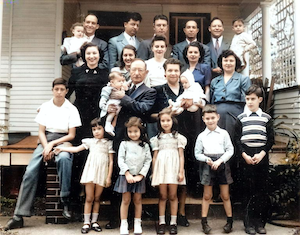 Louis Dumes Family taken at Louis and Rebecca's home at 103 E. St. Clair Street in Vincennes. <br><br>Top row L to R:<br><br>Bill Dumes with Sharon, Samuel Zoll, Hyman Dumes, Ben Karp, Sol Dumes with Ricky Dumes<br><br>Next Row:<br><br>Lilliam Dumes Zoll, Elaine Cohen Dumes, Evelyn Swimmer Dumes, Irene Melcher Dumes<br><br>Next Row:<br><br>Sol Francis Karp, Louis Dumes with Deborah Zoll Altschuler, Rebecca Stein Dumes with Denise Dumes, Jeannette Dumes Karp<br><br>Front row:<br><br>Beverly Karp Mahone, Cyril-Ann Zoll Rosenberg, Karen Karp Finkelstein, Michael Dumes, John Karp
