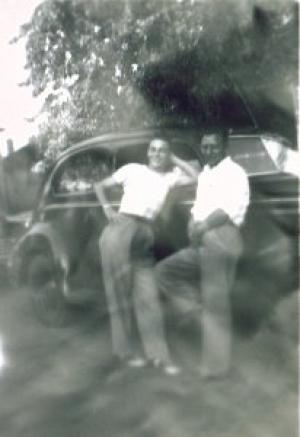 I think it's Stan Dumes on the left with William J Dumes on the right. (~1949)