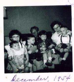 From left:
Anita Dansker holding Sandy Dumes, Harold Dumes, William J Dumes holding Adie Dansker, Mildred Dumes Dansker holding Alan Dansker - Dec '54 (1954)