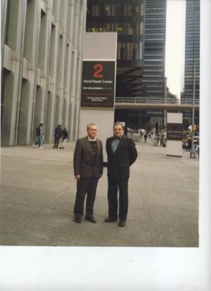 Leizer Dumesh on the right with his workmate Alexander in front of tower number 2 of the World Trade Center in NYC. (1991)