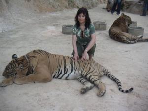Vitalija Dumesh in the temple of meditating tigers in Thailand (2008)