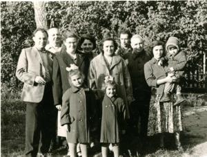Jurmala. The first row, l to r: Eugenia Dumesh (Valder), Olga Dumesh Mikheev. The second row, l to r: Jacob Bort, Elena Dumesh, Bluma Dumesh, Moisey Dumesh, Feiga Hodak holding her daughter. The third row, l to r: Israel Dumesh, Leja, Leizer Hodak (1958)